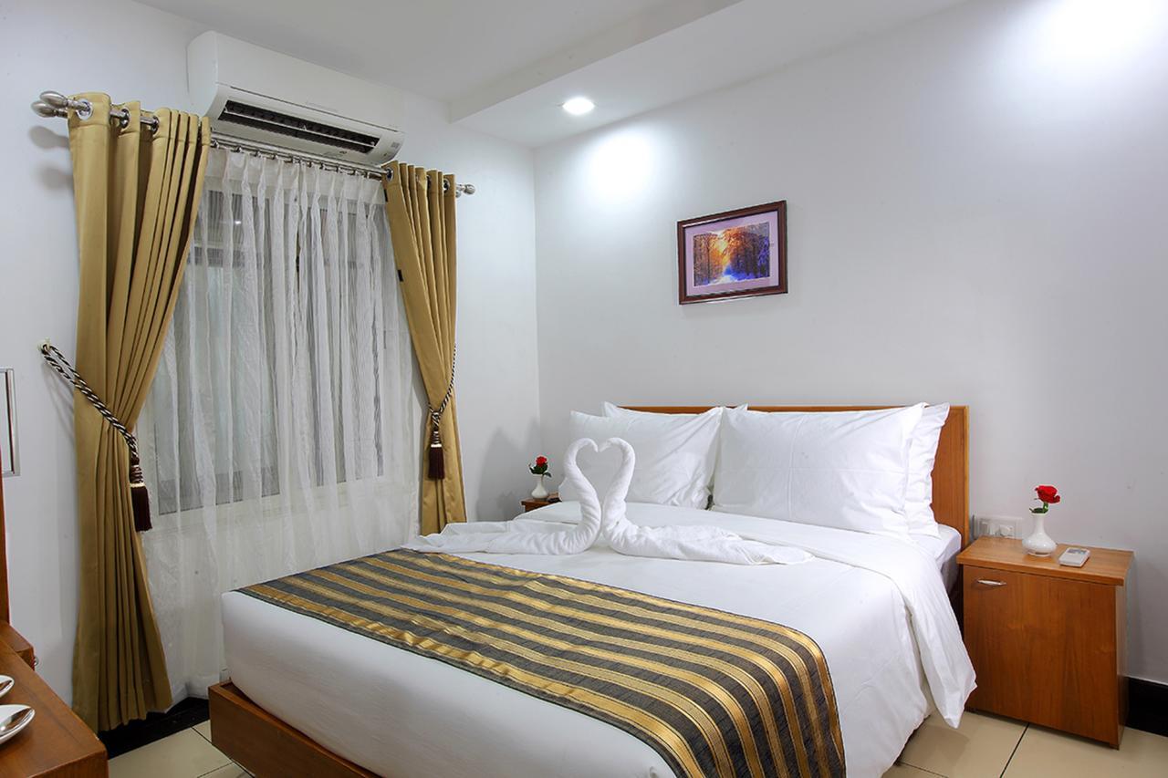Pgs Inn Kochi Extérieur photo