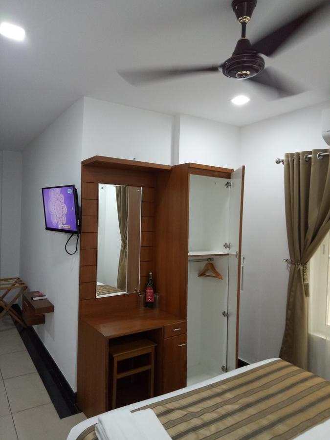 Pgs Inn Kochi Extérieur photo