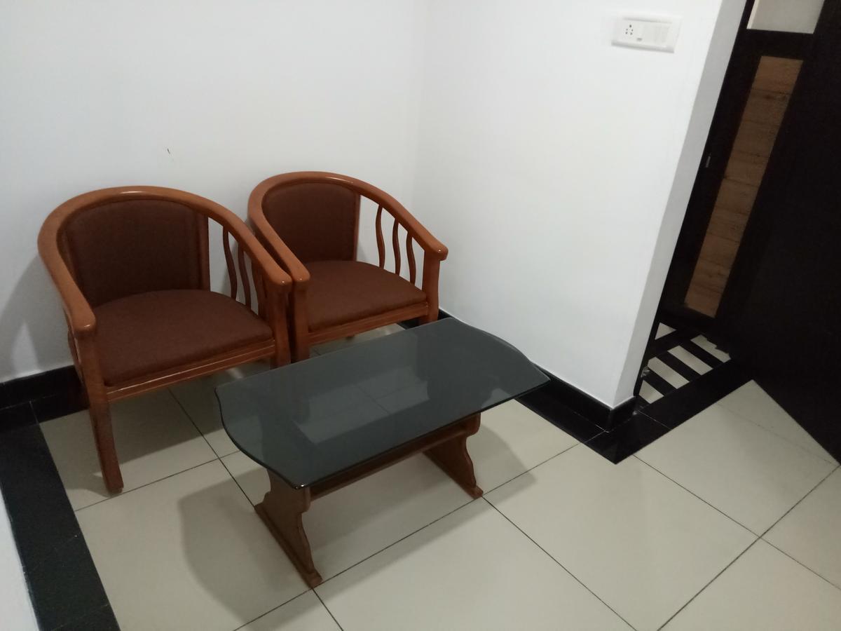 Pgs Inn Kochi Extérieur photo