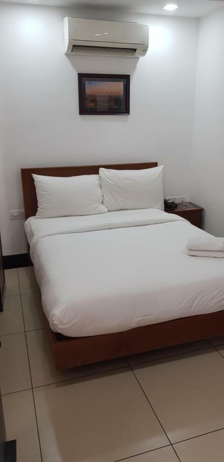 Pgs Inn Kochi Extérieur photo